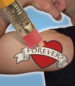Pencil eraser removing "Forever?" tattoo