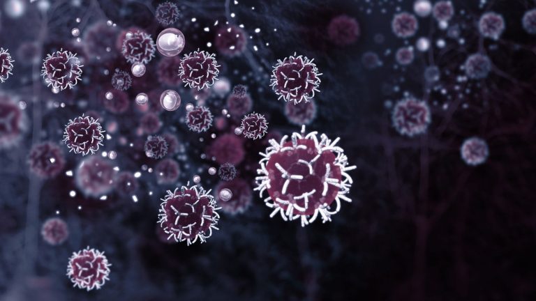 Monochrome illustration of cancer cells against a black background